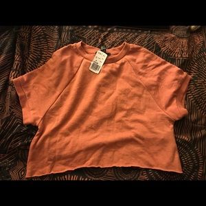 Burnt orange slightly distressed crop top